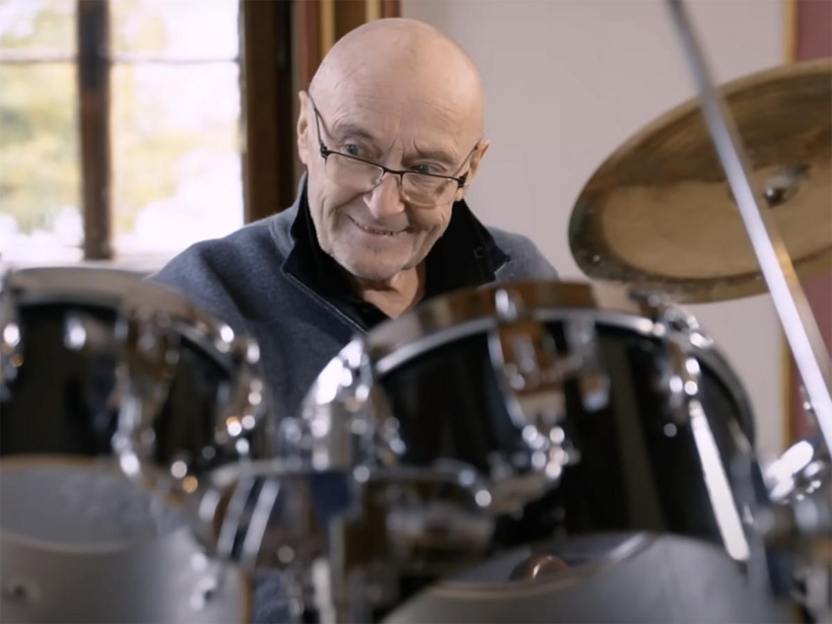 Watch Phil Collins Sit Down at Drum Set for First Time in Years